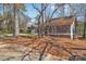 Exterior side view of the home and the driveway at 1077 Gauguin Ln, Tega Cay, SC 29708