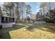 Large backyard with above ground pool, shed, and mature trees at 1304 Armstrong Ford Rd, Belmont, NC 28012