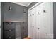 Inviting entry with built-in storage and stylish light fixtures at 1304 Armstrong Ford Rd, Belmont, NC 28012