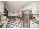 Modern kitchen features stainless steel appliances and breakfast bar at 1304 Armstrong Ford Rd, Belmont, NC 28012