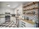 Updated kitchen with granite countertops and stylish backsplash at 1304 Armstrong Ford Rd, Belmont, NC 28012