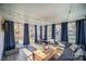 Bright sunroom with comfortable seating and backyard access at 1304 Armstrong Ford Rd, Belmont, NC 28012