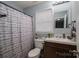 Clean bathroom with updated vanity and shower at 1316 Neal Hawkins Rd, Gastonia, NC 28056