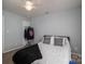 Well-lit bedroom with a ceiling fan and ample closet space at 1316 Neal Hawkins Rd, Gastonia, NC 28056