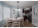 Bright breakfast nook with table and chairs at 1316 Neal Hawkins Rd, Gastonia, NC 28056