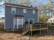 Backyard with wooden deck and spacious grassy area at 1316 Neal Hawkins Rd, Gastonia, NC 28056