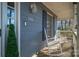 Side view of a porch with rocking chairs and house number at 1316 Neal Hawkins Rd, Gastonia, NC 28056