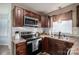 Kitchen with stainless steel appliances and wood cabinets at 1316 Neal Hawkins Rd, Gastonia, NC 28056