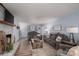 Spacious living room with fireplace and comfy gray couches at 1316 Neal Hawkins Rd, Gastonia, NC 28056