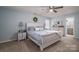 Spacious main bedroom with carpeted floor and en-suite bathroom at 1316 Neal Hawkins Rd, Gastonia, NC 28056