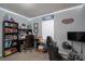 Home office with gaming chair and shelving at 1316 Neal Hawkins Rd, Gastonia, NC 28056