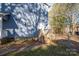 Side yard with steps leading to the backyard at 1316 Neal Hawkins Rd, Gastonia, NC 28056