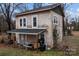 Rear view of the building with covered porch and upper deck at 1618 4Th St, Salisbury, NC 28144