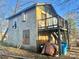 Exterior view of a small building with a wooden deck at 1618 4Th St, Salisbury, NC 28144