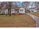 Cozy single-story home with carport and brick foundation, nestled in a mature landscape at 1618 4Th St, Salisbury, NC 28144