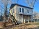 House exterior with wooden stairs and covered porch at 1618 4Th St, Salisbury, NC 28144