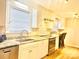 Updated kitchen featuring modern lighting, stainless steel appliances and white cabinetry at 1618 4Th St, Salisbury, NC 28144