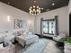 Bedroom with a gold bed frame and a gray color scheme at 19329 Watermark Dr # 261/262, Cornelius, NC 28031