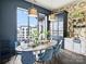 Elegant dining area with blue velvet chairs at 19329 Watermark Dr # 261/262, Cornelius, NC 28031
