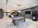Game room features a pool table, dartboard, and a large screen TV at 19329 Watermark Dr # 261/262, Cornelius, NC 28031