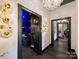 Elegant hallway with access to home theater and sitting area at 19329 Watermark Dr # 261/262, Cornelius, NC 28031
