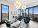 Home office with glass desk, two armchairs, and balcony access at 19329 Watermark Dr # 261/262, Cornelius, NC 28031