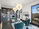 Bright home office with built-in shelving and window views at 19329 Watermark Dr # 261/262, Cornelius, NC 28031