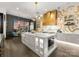 Luxury kitchen with large island and gold accents at 19329 Watermark Dr # 261/262, Cornelius, NC 28031