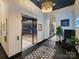 Elegant lobby with elevator and stylish seating at 19329 Watermark Dr # 261/262, Cornelius, NC 28031