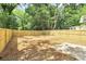 Large, fenced backyard with ample space for outdoor activities and entertaining. Perfect for dogs! at 204 N Yadkin Ave, Spencer, NC 28150