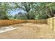 Large backyard featuring newly installed wood fence at 204 N Yadkin Ave, Spencer, NC 28150