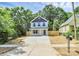New construction home with charming covered porch, new landscaping and fence at 204 N Yadkin Ave, Spencer, NC 28150