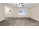 Inviting living room featuring hardwood floors, neutral walls, and a bright window at 204 N Yadkin Ave, Spencer, NC 28150