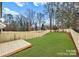 Private backyard with wooden deck and fenced at 2066 Eaton Rd, Charlotte, NC 28205