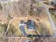Aerial view showing house, detached garage, and large yard at 220 Augusta Dr, Statesville, NC 28625