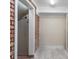 Unfinished basement area with exposed brick wall at 220 Augusta Dr, Statesville, NC 28625