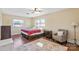 Charming bedroom with hardwood floors and ceiling fan at 220 Augusta Dr, Statesville, NC 28625