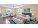 Spacious bedroom with hardwood floors and a ceiling fan at 220 Augusta Dr, Statesville, NC 28625