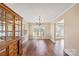 Formal dining room with hardwood floors and a built-in hutch at 220 Augusta Dr, Statesville, NC 28625