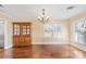 Bright dining room features hardwood floors and a built-in hutch at 220 Augusta Dr, Statesville, NC 28625
