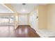Bright entryway with hardwood floors and coat closets at 220 Augusta Dr, Statesville, NC 28625