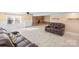 Gathering room with fireplace and comfortable leather recliners at 220 Augusta Dr, Statesville, NC 28625
