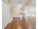 Hardwood floor hallway with access to living areas and stairs at 220 Augusta Dr, Statesville, NC 28625