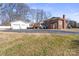 Brick house with detached garage and large yard at 220 Augusta Dr, Statesville, NC 28625
