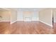 Living room with hardwood floors and built-in shelving at 220 Augusta Dr, Statesville, NC 28625