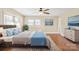 Main bedroom with hardwood floors and a ceiling fan at 220 Augusta Dr, Statesville, NC 28625