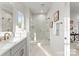 Bright bathroom with a frameless glass shower, modern fixtures, and neutral tones at 2221 Edison St, Charlotte, NC 28206