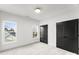 Well-lit bedroom with a neutral color scheme, providing a serene and inviting space at 2221 Edison St, Charlotte, NC 28206