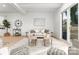 Cozy living room features stylish furniture, a modern fireplace, and abundant natural light from a sliding glass door at 2221 Edison St, Charlotte, NC 28206