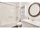 Clean bathroom with a shower/tub combo, vanity, and a large mirror at 27097 Cove Ln, Tega Cay, SC 29708